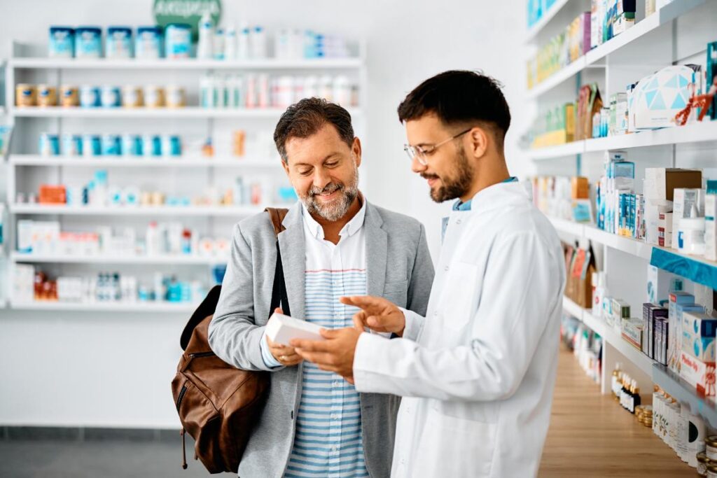 a pharmacist informs a patient about their medication