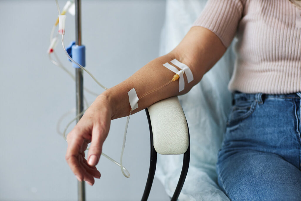 a person receives intravenous treatment for multiple sclerosis